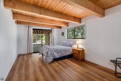 Relax and stay in this charming 3-bedroom, 2-bath cabin nestled on Pine Mountain Lake Country Club in California - for sale on GolfHomes.com, golf home, golf lot