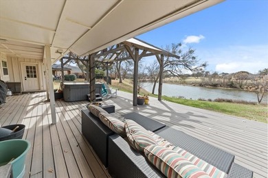 Welcome to your dream home!  This beautifully designed 3 bedroom on The Lake Country Club - Lake Waco in Texas - for sale on GolfHomes.com, golf home, golf lot