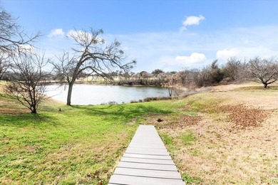 Welcome to your dream home!  This beautifully designed 3 bedroom on The Lake Country Club - Lake Waco in Texas - for sale on GolfHomes.com, golf home, golf lot