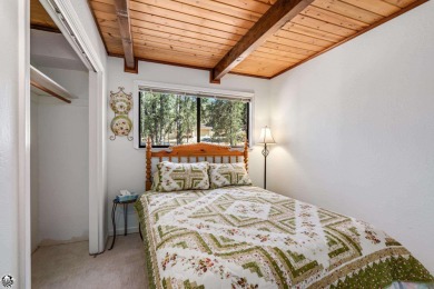 Relax and stay in this charming 3-bedroom, 2-bath cabin nestled on Pine Mountain Lake Country Club in California - for sale on GolfHomes.com, golf home, golf lot