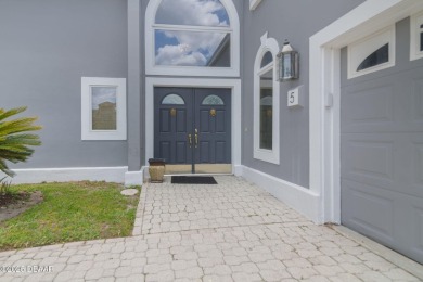 Stunning 3-Bedroom, 3-Bath Luxury Home in the Prestigious on Plantation Bay Golf and Country Club in Florida - for sale on GolfHomes.com, golf home, golf lot