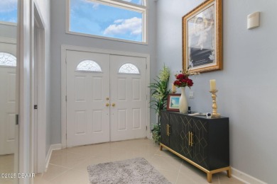 Stunning 3-Bedroom, 3-Bath Luxury Home in the Prestigious on Plantation Bay Golf and Country Club in Florida - for sale on GolfHomes.com, golf home, golf lot