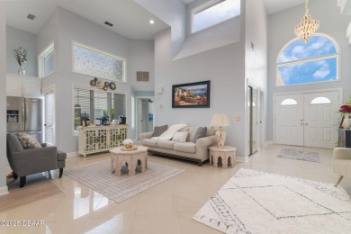Stunning 3-Bedroom, 3-Bath Luxury Home in the Prestigious on Plantation Bay Golf and Country Club in Florida - for sale on GolfHomes.com, golf home, golf lot