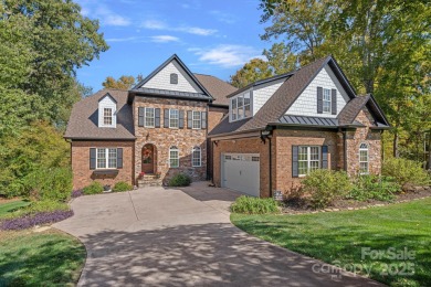 Welcome to 7809 Oak Haven Lane, a beautifully appointed home in on Cowans Ford Country Club in North Carolina - for sale on GolfHomes.com, golf home, golf lot