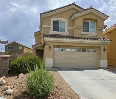 Discover this stunning two-story home nestled in the prestigious on Rhodes Ranch Golf Club in Nevada - for sale on GolfHomes.com, golf home, golf lot