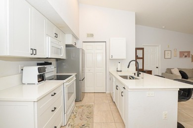 Corner unit on the second floor overlooking the golf course and on  in Florida - for sale on GolfHomes.com, golf home, golf lot