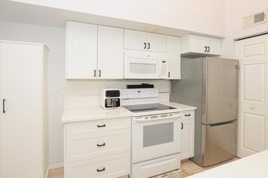 Corner unit on the second floor overlooking the golf course and on St. Lucie Trail Golf Club in Florida - for sale on GolfHomes.com, golf home, golf lot