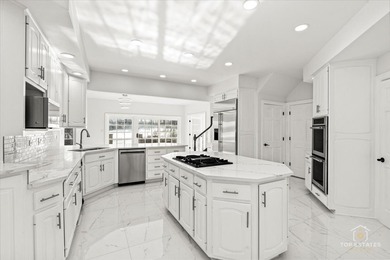 Experience refined living in this stunning custom brick estate on Crystal Tree Golf and Country Club in Illinois - for sale on GolfHomes.com, golf home, golf lot