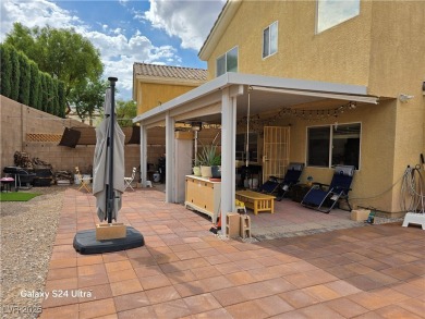 Discover this stunning two-story home nestled in the prestigious on Rhodes Ranch Golf Club in Nevada - for sale on GolfHomes.com, golf home, golf lot