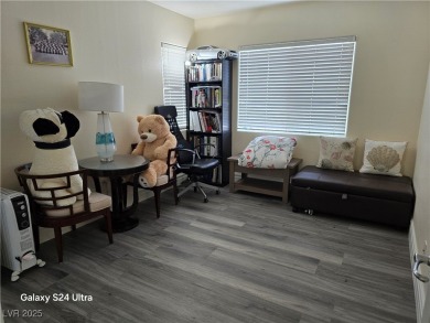 Discover this stunning two-story home nestled in the prestigious on Rhodes Ranch Golf Club in Nevada - for sale on GolfHomes.com, golf home, golf lot