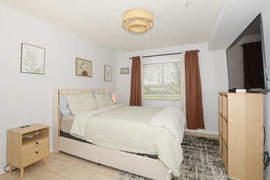 Corner unit on the second floor overlooking the golf course and on St. Lucie Trail Golf Club in Florida - for sale on GolfHomes.com, golf home, golf lot