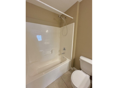 This well-maintained end-unit townhome features an open floor on  in Florida - for sale on GolfHomes.com, golf home, golf lot