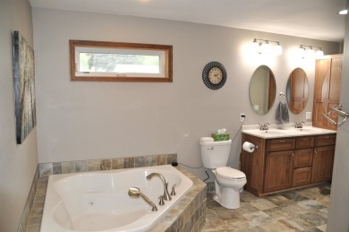 NEW LISTING!!  Welcome to this nicely maintained 4 bedroom, 3 on West Brook Hills Golf Course in Wisconsin - for sale on GolfHomes.com, golf home, golf lot