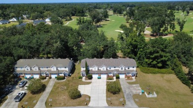This well-maintained end-unit townhome features an open floor on  in Florida - for sale on GolfHomes.com, golf home, golf lot