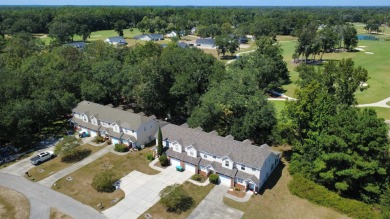 This well-maintained end-unit townhome features an open floor on  in Florida - for sale on GolfHomes.com, golf home, golf lot