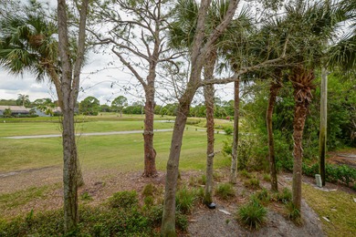 Corner unit on the second floor overlooking the golf course and on St. Lucie Trail Golf Club in Florida - for sale on GolfHomes.com, golf home, golf lot