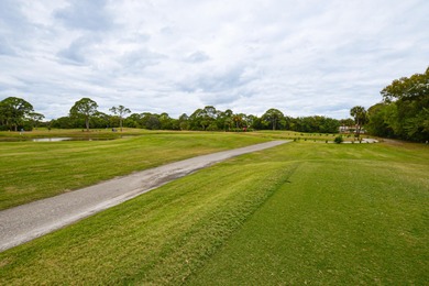 Corner unit on the second floor overlooking the golf course and on St. Lucie Trail Golf Club in Florida - for sale on GolfHomes.com, golf home, golf lot