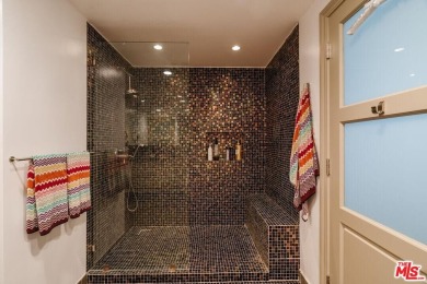 Experience luxury living at its finest in this stunning on Los Angeles Country Club in California - for sale on GolfHomes.com, golf home, golf lot