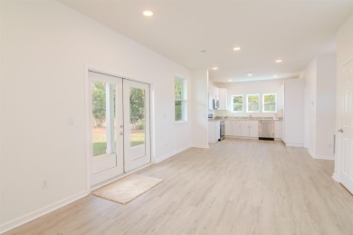 This newly constructed 3-bedroom, 3.5-bathroom home in on St. James Bay in Florida - for sale on GolfHomes.com, golf home, golf lot