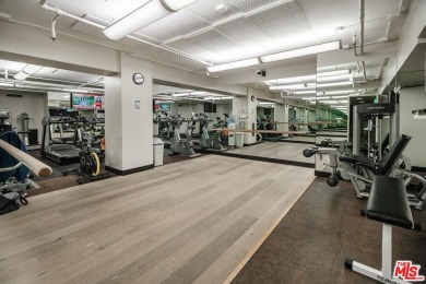 Experience luxury living at its finest in this stunning on Los Angeles Country Club in California - for sale on GolfHomes.com, golf home, golf lot