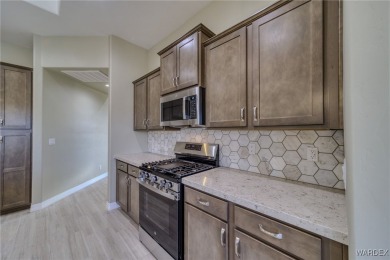 Welcome to this stunning new construction home located in the on Los Lagos Golf Club in Arizona - for sale on GolfHomes.com, golf home, golf lot