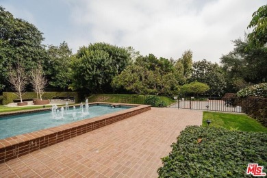 Experience luxury living at its finest in this stunning on Los Angeles Country Club in California - for sale on GolfHomes.com, golf home, golf lot