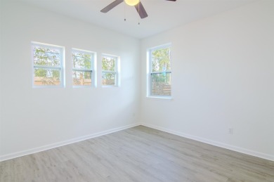 This newly constructed 3-bedroom, 3.5-bathroom home in on St. James Bay in Florida - for sale on GolfHomes.com, golf home, golf lot