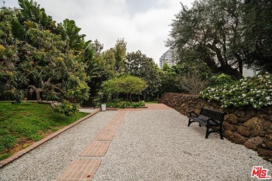 Experience luxury living at its finest in this stunning on Los Angeles Country Club in California - for sale on GolfHomes.com, golf home, golf lot