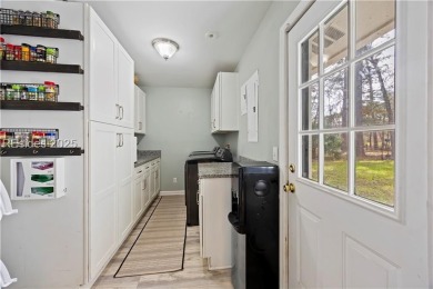 Discover this beautifully updated 4-bed, 3-bath home in the on Ladys Island Country Club in South Carolina - for sale on GolfHomes.com, golf home, golf lot