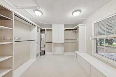Move-in ready and full of possibilities, this 4-bedroom, 3-bath on Ladys Island Country Club in South Carolina - for sale on GolfHomes.com, golf home, golf lot