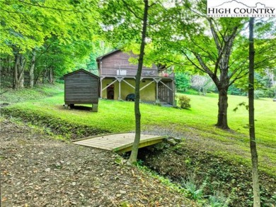 Perfect little getaway or vacation rental! Very cute mountain on Mountain Aire Golf Course in North Carolina - for sale on GolfHomes.com, golf home, golf lot