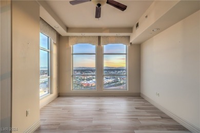 Discover elevated living with this stunning 14th-floor corner on Badlands Golf Club in Nevada - for sale on GolfHomes.com, golf home, golf lot