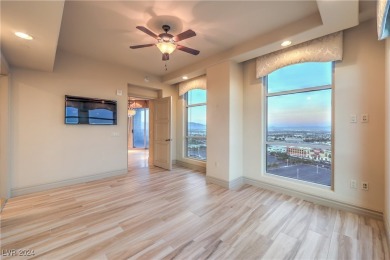 Discover elevated living with this stunning 14th-floor corner on Badlands Golf Club in Nevada - for sale on GolfHomes.com, golf home, golf lot