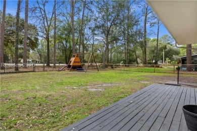 Discover this beautifully updated 4-bed, 3-bath home in the on Ladys Island Country Club in South Carolina - for sale on GolfHomes.com, golf home, golf lot