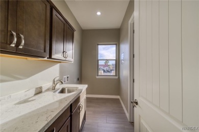 Welcome to this stunning new construction home located in the on Los Lagos Golf Club in Arizona - for sale on GolfHomes.com, golf home, golf lot