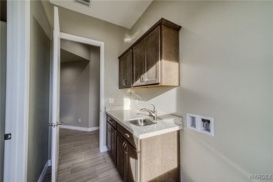 Welcome to this stunning new construction home located in the on Los Lagos Golf Club in Arizona - for sale on GolfHomes.com, golf home, golf lot