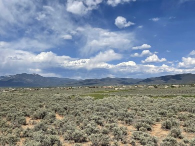 At 3.2 acres, this premier building lot in the Taos County Club on Taos Country Club in New Mexico - for sale on GolfHomes.com, golf home, golf lot