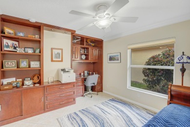 RARELY AVAILABLE EXTENDED GENOVA MODEL SET ON A BEAUTIFUL CANAL on Westchester Golf and Country Club in Florida - for sale on GolfHomes.com, golf home, golf lot