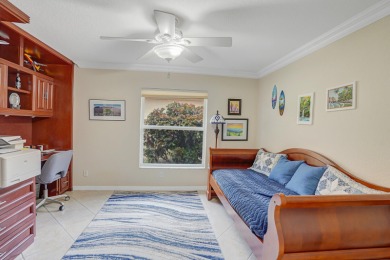 RARELY AVAILABLE EXTENDED GENOVA MODEL SET ON A BEAUTIFUL CANAL on Westchester Golf and Country Club in Florida - for sale on GolfHomes.com, golf home, golf lot