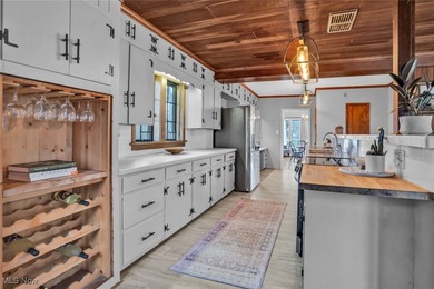 Here's your chance to own two distinctive homes on one on Alliance Country Club in Ohio - for sale on GolfHomes.com, golf home, golf lot