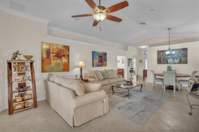 RARELY AVAILABLE EXTENDED GENOVA MODEL SET ON A BEAUTIFUL CANAL on Westchester Golf and Country Club in Florida - for sale on GolfHomes.com, golf home, golf lot