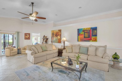 RARELY AVAILABLE EXTENDED GENOVA MODEL SET ON A BEAUTIFUL CANAL on Westchester Golf and Country Club in Florida - for sale on GolfHomes.com, golf home, golf lot