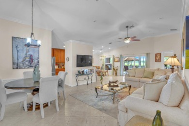 RARELY AVAILABLE EXTENDED GENOVA MODEL SET ON A BEAUTIFUL CANAL on Westchester Golf and Country Club in Florida - for sale on GolfHomes.com, golf home, golf lot