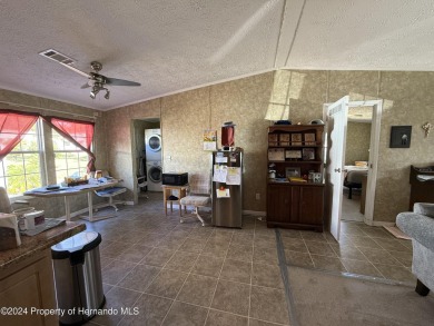 3 bedrooms 2 baths with huge bonusroom ideal for mother in law on High Point Golf Club, Inc. in Florida - for sale on GolfHomes.com, golf home, golf lot