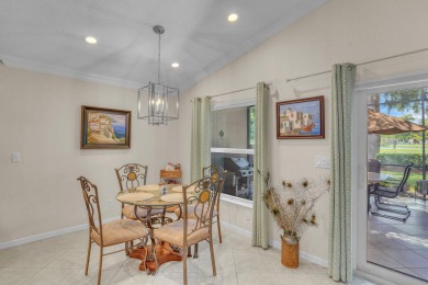 RARELY AVAILABLE EXTENDED GENOVA MODEL SET ON A BEAUTIFUL CANAL on Westchester Golf and Country Club in Florida - for sale on GolfHomes.com, golf home, golf lot