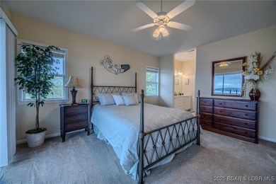 Top-Floor Palisades Condo with Main Channel Views! Enjoy on Tan-Tar-A Golf Club in Missouri - for sale on GolfHomes.com, golf home, golf lot