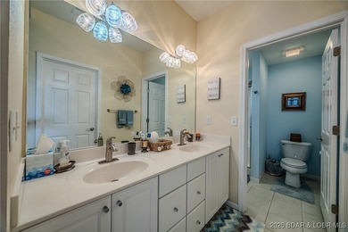 Top-Floor Palisades Condo with Main Channel Views! Enjoy on Tan-Tar-A Golf Club in Missouri - for sale on GolfHomes.com, golf home, golf lot