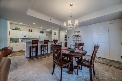 Top-Floor Palisades Condo with Main Channel Views! Enjoy on Tan-Tar-A Golf Club in Missouri - for sale on GolfHomes.com, golf home, golf lot
