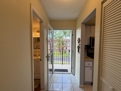 Lowest priced 1BR, 1.5BA 55+ condo with unlimited golf and on Monterey Yacht and Country Club in Florida - for sale on GolfHomes.com, golf home, golf lot