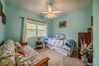 Top-Floor Palisades Condo with Main Channel Views! Enjoy on Tan-Tar-A Golf Club in Missouri - for sale on GolfHomes.com, golf home, golf lot